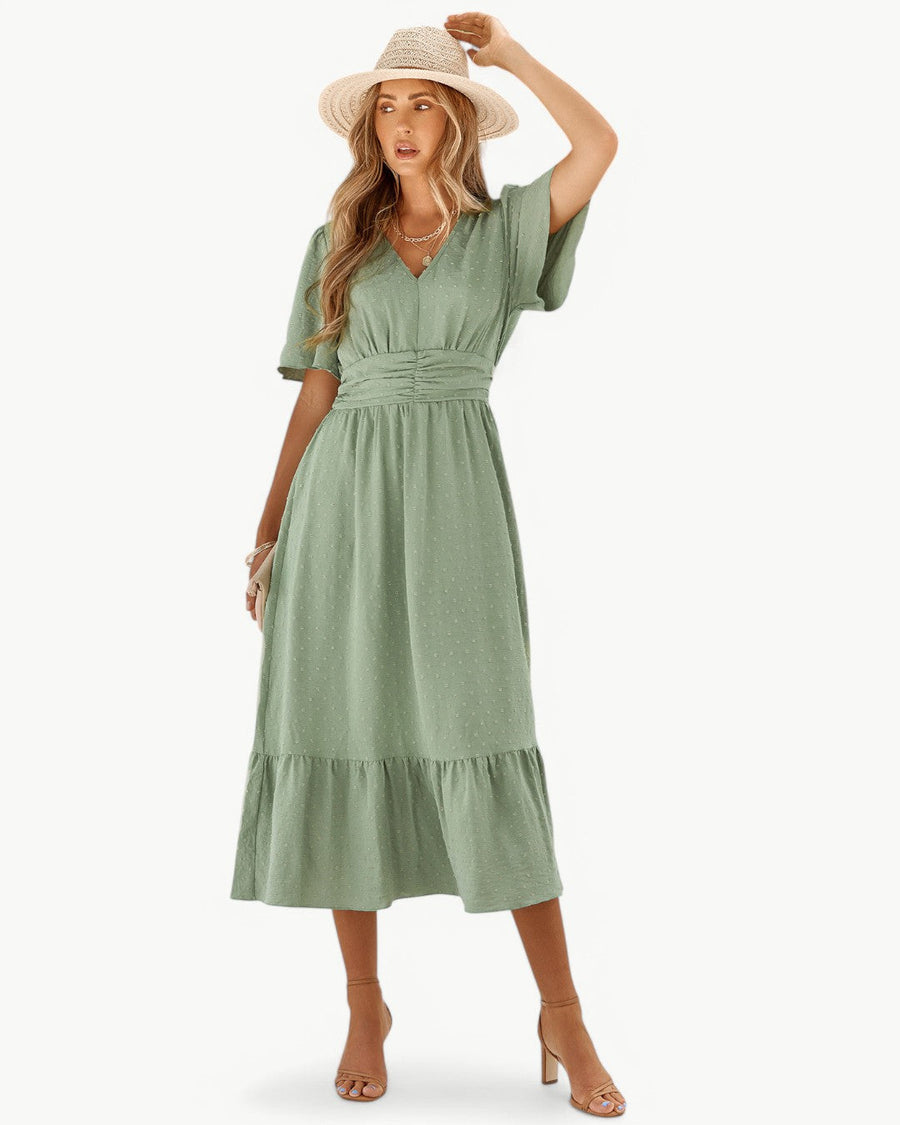 KLARISSE | ELEGANT FLÖDANDE SOMMAR V-HALS KLÄNNING