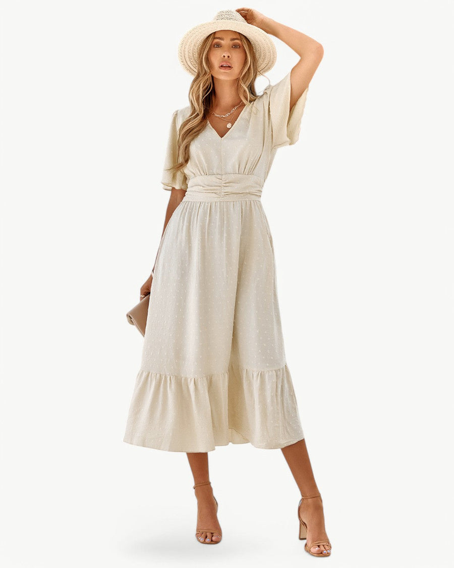 KLARISSE | ELEGANT FLÖDANDE SOMMAR V-HALS KLÄNNING